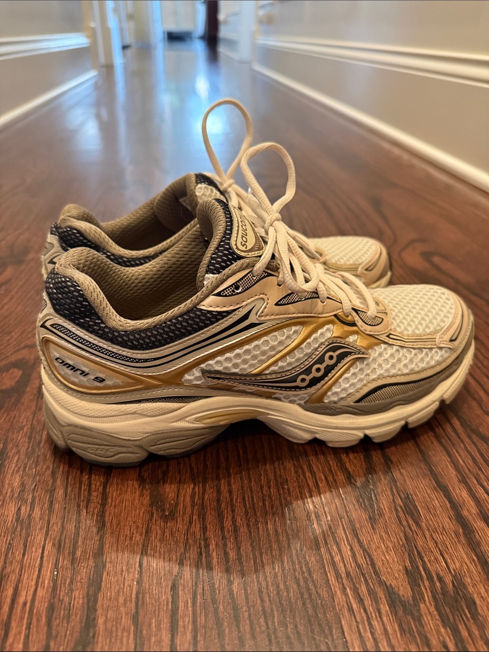 Saucony Cream and Gold Athletic Sneakers